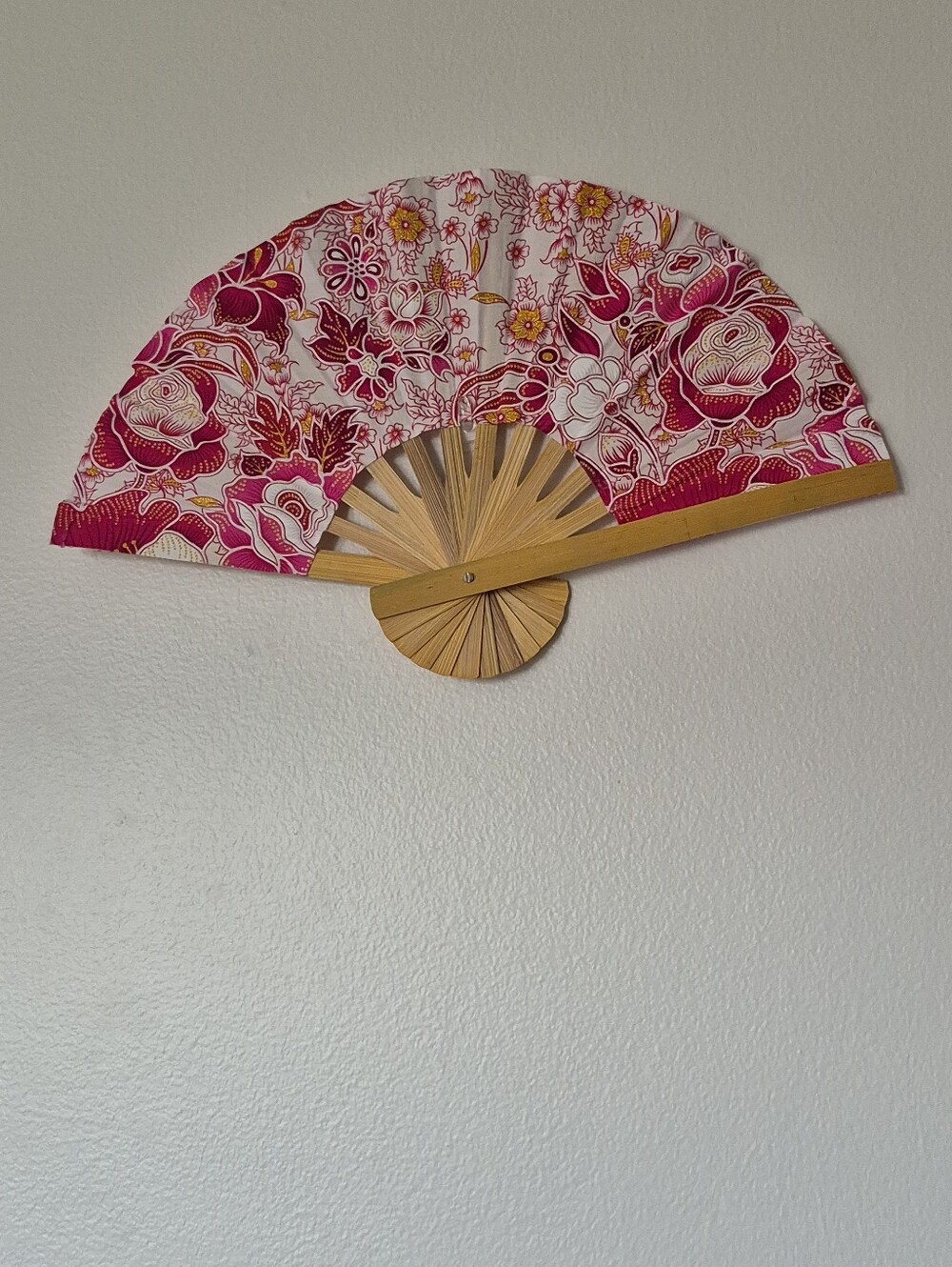 Thai folding fan with a floral fabric pattern on a bamboo frame,home decor